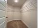 Large walk-in closet with wire shelving at 4426 Nw 2Nd Ct, Ocala, FL 34475