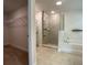 Bathroom with soaking tub, walk-in shower, and walk-in closet at 4426 Nw 2Nd Ct, Ocala, FL 34475
