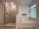 Bathroom with soaking tub and walk-in shower at 4426 Nw 2Nd Ct, Ocala, FL 34475