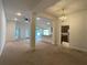 Open living room with view into kitchen at 4426 Nw 2Nd Ct, Ocala, FL 34475