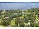 Aerial view showing house location near lake at 12369 Se 130Th Ct, Ocklawaha, FL 32179