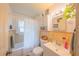 Clean bathroom with tub/shower combo and updated vanity at 12369 Se 130Th Ct, Ocklawaha, FL 32179