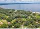 Aerial view showing house location near lake at 12369 Se 130Th Ct, Ocklawaha, FL 32179