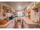 Charming kitchen with updated countertops and ample cabinet storage at 12369 Se 130Th Ct, Ocklawaha, FL 32179