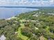 Aerial view showing house location near lake at 12369 Se 130Th Ct, Ocklawaha, FL 32179