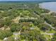 Aerial view showing house location near lake at 12369 Se 130Th Ct, Ocklawaha, FL 32179
