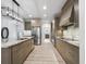 Spacious kitchen with stainless steel appliances and granite countertops at 1620 Nw 73Rd Ter, Ocala, FL 34482