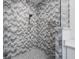 Elegant shower with grey chevron tile and glass enclosure at 1620 Nw 73Rd Ter, Ocala, FL 34482