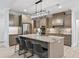 Large kitchen island with seating and granite countertop at 1620 Nw 73Rd Ter, Ocala, FL 34482
