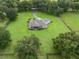 Aerial view of property highlighting the home and large backyard at 1620 Nw 73Rd Ter, Ocala, FL 34482