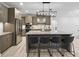 Modern kitchen with large island and stainless steel appliances at 1620 Nw 73Rd Ter, Ocala, FL 34482