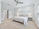 Spacious bedroom with large window and ceiling fan at 1620 Nw 73Rd Ter, Ocala, FL 34482