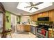 Kitchen boasts stainless steel appliances and a skylight at 10978 Sw 83Rd Ave, Ocala, FL 34481