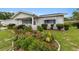 Cute ranch home with landscaped front yard and well-maintained lawn at 10978 Sw 83Rd Ave, Ocala, FL 34481