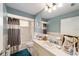 Clean bathroom with a bathtub, shower, and updated vanity at 10978 Sw 83Rd Ave, Ocala, FL 34481