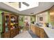 Kitchen features wood cabinets, stainless steel appliances, and a skylight at 10978 Sw 83Rd Ave, Ocala, FL 34481