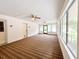 Spacious screened porch with wood flooring at 21389 Sw 102Nd Street Rd, Dunnellon, FL 34431