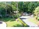Small parking area with landscaping and a restroom at 21389 Sw 102Nd Street Rd, Dunnellon, FL 34431