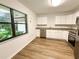 Updated kitchen with stainless steel appliances and granite countertops at 21389 Sw 102Nd Street Rd, Dunnellon, FL 34431