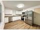 Bright kitchen with updated cabinetry and stainless steel appliances at 21389 Sw 102Nd Street Rd, Dunnellon, FL 34431