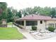 Rear view of home showing patio and yard at 21389 Sw 102Nd Street Rd, Dunnellon, FL 34431