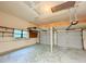 Garage with upper storage and double doors at 21389 Sw 102Nd Street Rd, Dunnellon, FL 34431
