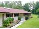 Home exterior with stone accents and steps at 21389 Sw 102Nd Street Rd, Dunnellon, FL 34431