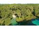 Aerial view of spring-fed river with people swimming at 21389 Sw 102Nd Street Rd, Dunnellon, FL 34431