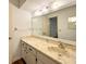 Clean bathroom with vanity and large mirror at 21389 Sw 102Nd Street Rd, Dunnellon, FL 34431