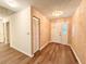Bright entryway with wood-look floors and built-in storage at 21389 Sw 102Nd Street Rd, Dunnellon, FL 34431