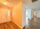 View of entryway, showing access to other rooms and light wood floors at 21389 Sw 102Nd Street Rd, Dunnellon, FL 34431