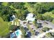 Aerial view of community clubhouse, pool, and tennis courts at 21389 Sw 102Nd Street Rd, Dunnellon, FL 34431