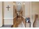 Bright hallway with tile flooring and neutral wall colors at 9680 Ne 25Th Ct, Anthony, FL 32617
