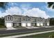 Row of townhouses with attached garages at 6595 Sw 81St Loop, Ocala, FL 34476