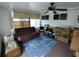 Sunroom with seating area and backyard access at 8750 Sw 116Th Place Rd, Ocala, FL 34481