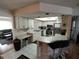 Kitchen features stainless steel appliances and ample cabinetry at 8750 Sw 116Th Place Rd, Ocala, FL 34481