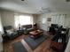 Living room with sofa, coffee table, and wood floors at 8750 Sw 116Th Place Rd, Ocala, FL 34481