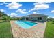 Beautiful pool and expansive backyard with lush grass at 1934 Nw 79Th Loop, Ocala, FL 34475