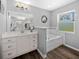 Main bathroom features a soaking tub, double vanity, and separate shower at 1934 Nw 79Th Loop, Ocala, FL 34475