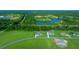 Aerial view of a house and lot with lake views in a new development at 1934 Nw 79Th Loop, Ocala, FL 34475
