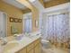 Bathroom with double vanity, shower, and bathtub at 11196 Ne 227Th Place Rd, Fort Mc Coy, FL 32134
