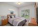 Cozy bedroom with window and garden view at 11196 Ne 227Th Place Rd, Fort Mc Coy, FL 32134