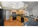 Kitchen with stainless steel appliances and wood cabinets at 11196 Ne 227Th Place Rd, Fort Mc Coy, FL 32134