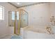 Bathroom with shower and bathtub at 11196 Ne 227Th Place Rd, Fort Mc Coy, FL 32134