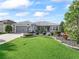 Charming house with well-manicured lawn at 3812 Nottingham Loop, The Villages, FL 32163
