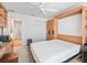 Bright bedroom with a built-in murphy bed and an ensuite bathroom at 3812 Nottingham Loop, The Villages, FL 32163