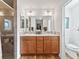 Double vanity bathroom with walk-in shower at 3812 Nottingham Loop, The Villages, FL 32163