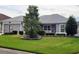 Beautiful house with landscaped front yard at 3812 Nottingham Loop, The Villages, FL 32163