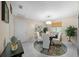 Bright dining area with a glass table and four chairs at 10820 Sw 87Th Ter, Ocala, FL 34481