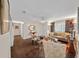 Bright living room featuring hardwood floors and ample natural light at 10820 Sw 87Th Ter, Ocala, FL 34481